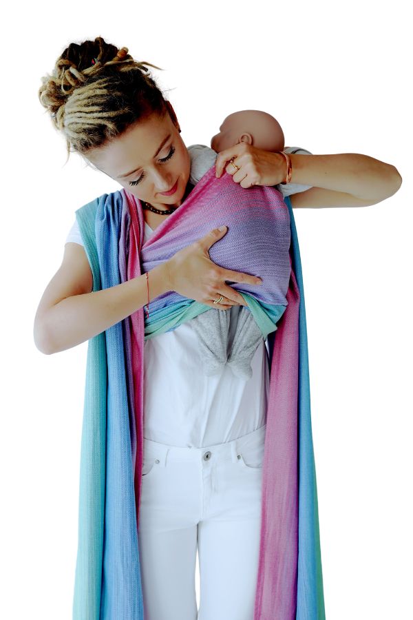 Step 8: Slide baby onto chest