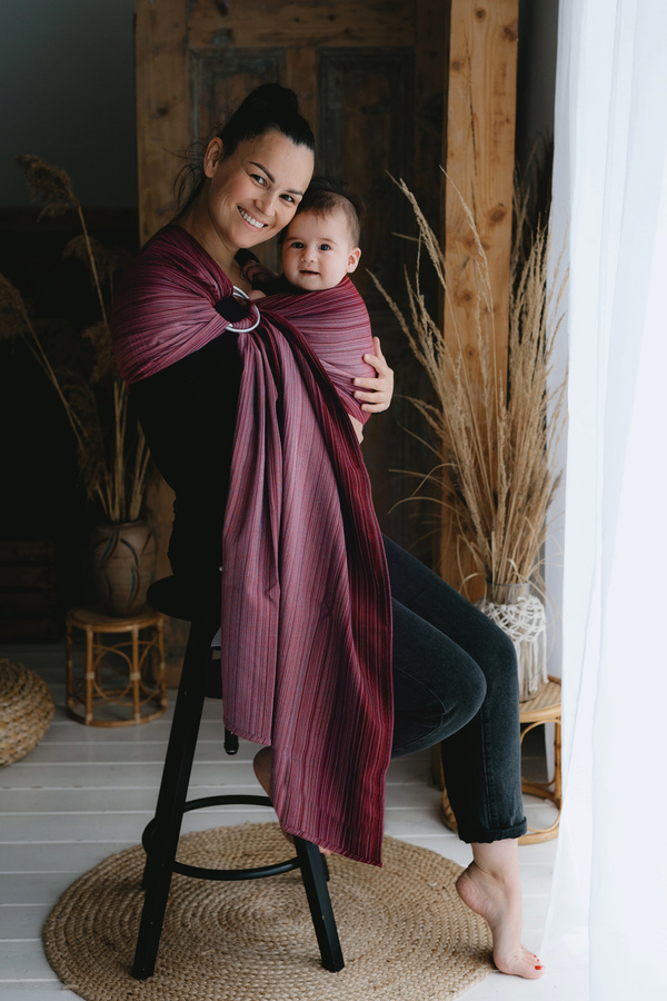 Red ring sling Jasper M – comfortable babywearing from the very first days of life